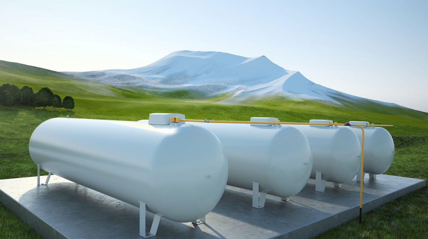 Vue aérienne d'une installation de production de biopropane à partir de matières premières végétales, avec cuves et structures industrielles